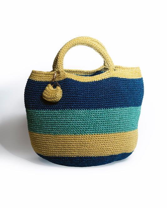 Crocheted bag with blue, green, and yellow stripes on a white background