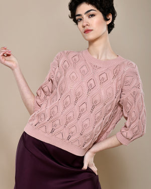 Cotton knit sweater in powder pink with three quarter sleeves.  Made in Italy. 