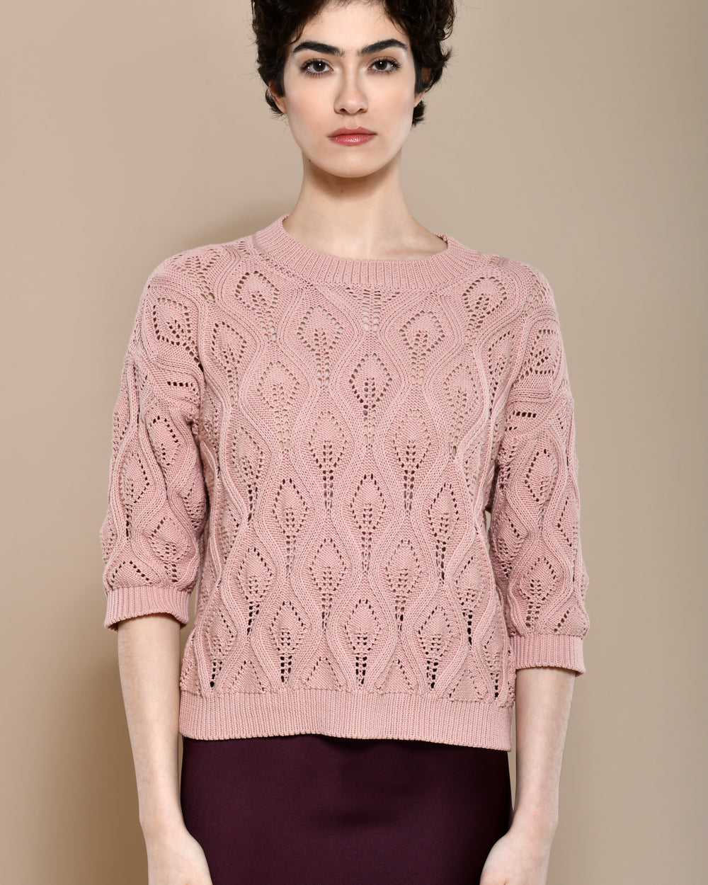 Cotton knit sweater in powder pink with three quarter sleeves.  Made in Italy. 