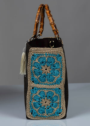 Monument_Motif Cotton Handbag, Crochet Flowers Turquoise, Bamboo Handles, White Silk Thread Tassel 